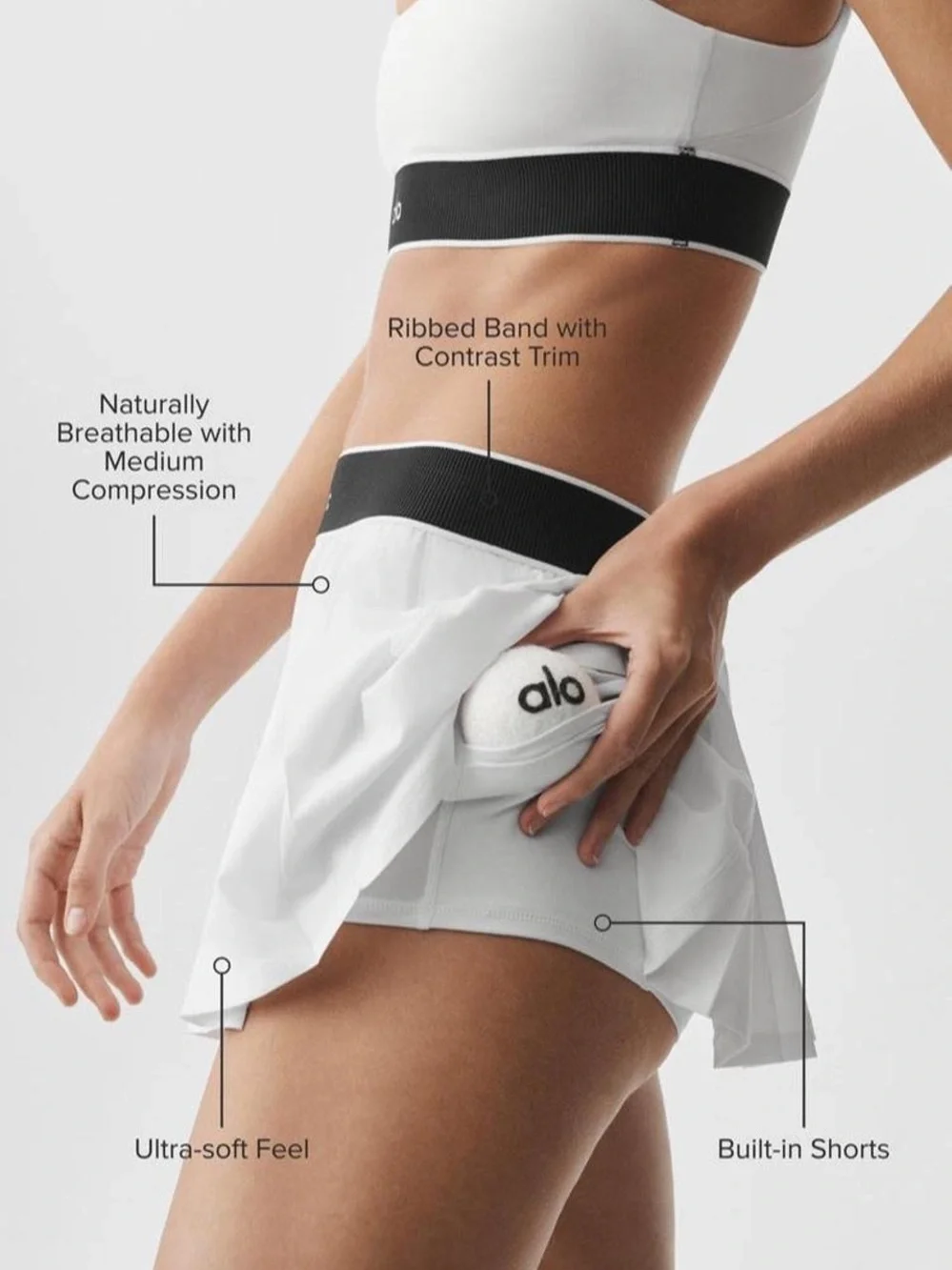 ALO Yoga Low Rise AMP It Up Tennis Skirt in White with Black Waistband. *NWT*